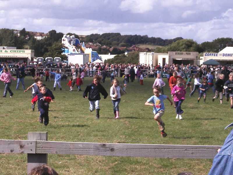 Children running back after the display