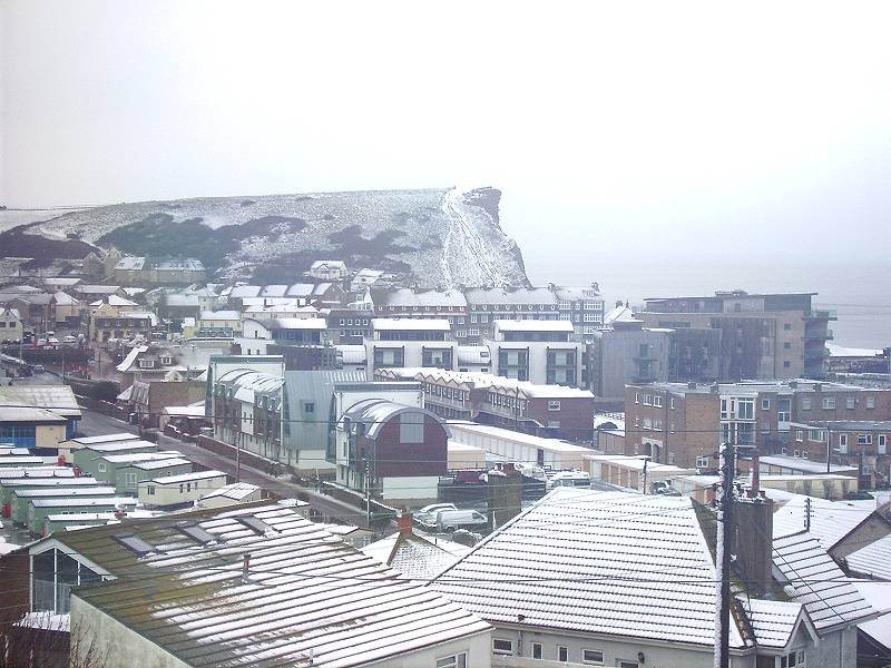 West Bay in the Snow, looking across West Bay to East Cliff